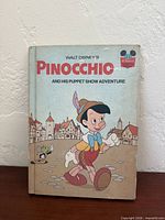 Front cover showing title, characters and wear