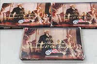 Front view of three proof set boxes showing artwork and years 2007, 2009, 2010