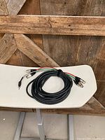 Entire coiled cable snake on table