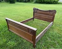 full view of assembled bed frame on grass