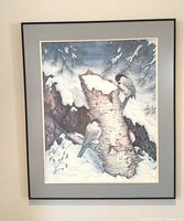 front view of framed bird winter landscape print