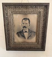 Frontal view of framed portrait