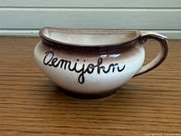 front view showing Demijohn script and glaze coloration