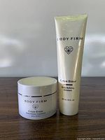 Front view of Crêpe Erase Body Firm Body Refining Exfoliant tube and Body Repair Treatment jar