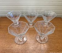 Five Dansk ribbed sherbet glasses on tabletop