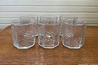 Six clear octagonal lowball glasses front view
