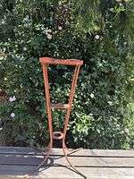 full view of iron side table plant stand front profile