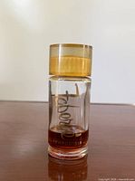 Front view showing Fabergé Aphrodisia branding and remaining liquid