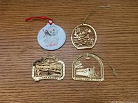 All four ornaments on tabletop