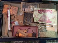 box with copper sheets, wood blocks, instruction booklet, hardware