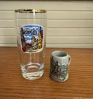 Tall Dinkelsbühl glass and miniature stein together