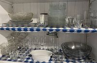 Full view of shelves with assorted glassware
