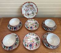 Full set showing six cup-saucer pairs and one plate