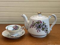 Teapot, teacup, and saucer full view