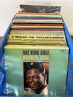Front view showing Nat King Cole Ramblin’ Rose at front of crate