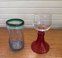 Both glasses side by side on wooden surface