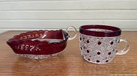 Mug and bowl side by side showing ruby flashing, patterns, and handles