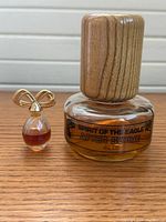 Front of both bottles showing labels and caps