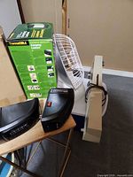 Boxed ThermaCELL lantern, Presto HeatDish, two black heaters, cream radiant heater