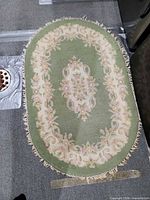 Full view of oval rug showing overall pattern and size