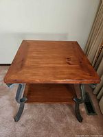 Overall view of square wood top end table with lower shelf