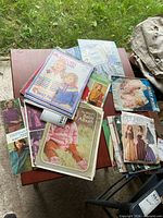 Overview of knitting pattern booklets on table