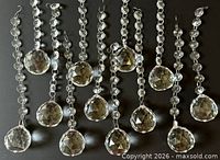 All 12 glass prism strands laid out showing full length and hooks