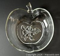 Top view of clear glass apple bowl showing embossed apple blossom design