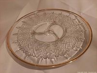 Full view of clear divided platter showing feather pattern and gold rim