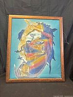 Full view of framed batik artwork