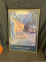 Full view of framed poster showing artwork, title text and frame