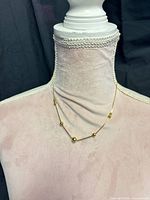 Necklace on form showing full design and length