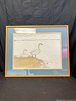 Framed artwork showing entire piece with frame and mats