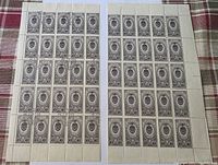 Two half-sheets side by side showing mint and pre-cancelled condition