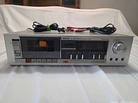 Front view of TEAC V-44C cassette deck with cables