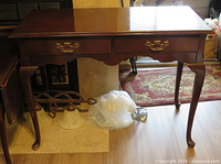 Rectangular mahogany side table front view