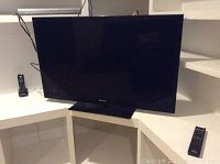 Front view of the Sony Bravia LCD television showing the black screen and stand.