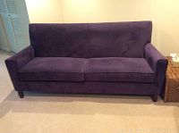 Front view of purple microsuede sofa