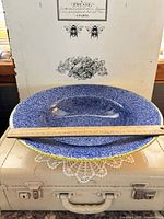 Top view showing blue sponge pattern and ruler for scale