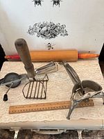Group shot showing all four utensils with ruler for scale