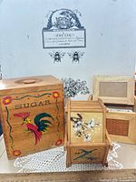 Group shot showing sugar canister, coaster holder with coasters, and recipe box