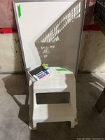 Whiteboard, accessory pack and stool group shot