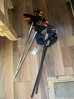 All four bar clamps on floor
