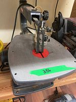 Top view of Craftsman scroll saw showing table and blade area