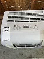 Top view showing electronic control panel, intake grille and side handle of Danby dehumidifier