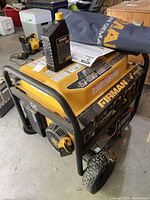 Overall view of Firman P08004 generator with oil bottle and cover on top