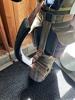 Full view of plaid Bennington golf bag with shoulder strap and zip pockets
