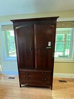 Full front view of Shermag armoire showing double doors and three drawers