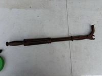 Full view of nail puller showing overall form and size