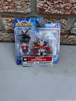 Front view of sealed Digimon Fusion Mikey & Shoutmon X4 figure pack
